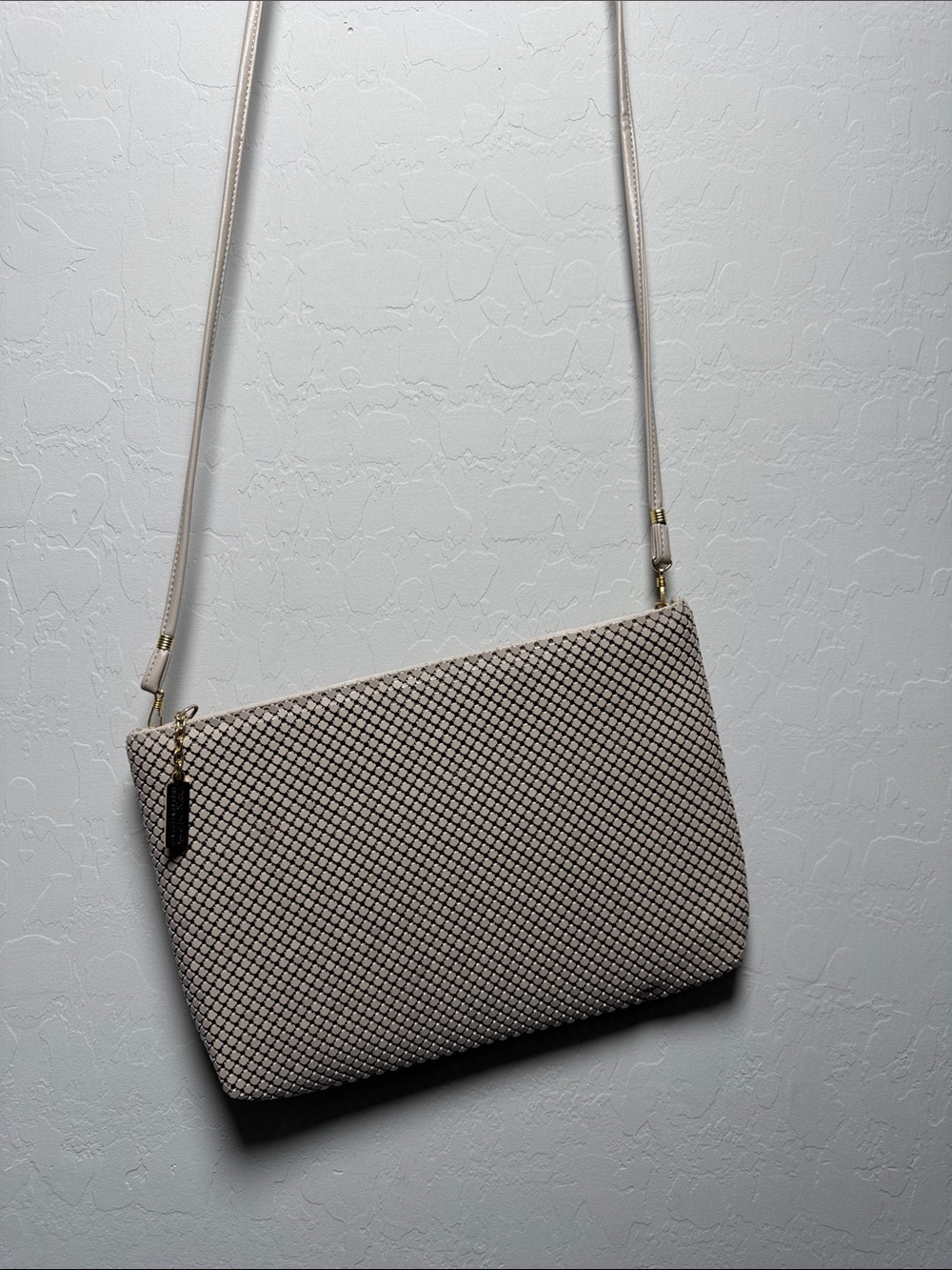 Vintage metal mesh crossbody evening bag with a shoulder strap and gold-tone.